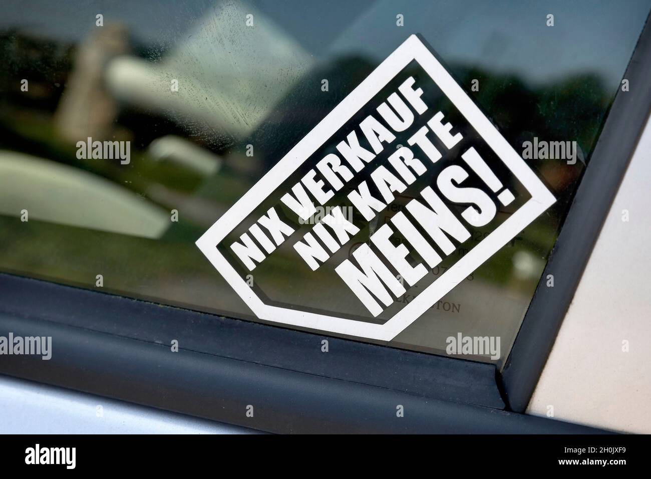 Nix Verkauf, nix Karte, meins!, imprint on a car window , Germany Stock Photo