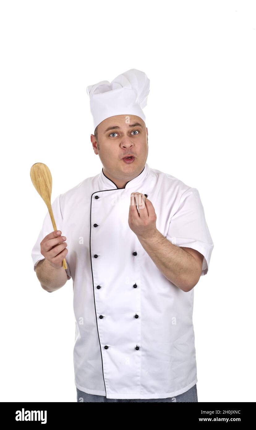 Cook with wooden spoon recommending a dish stock photo alamy