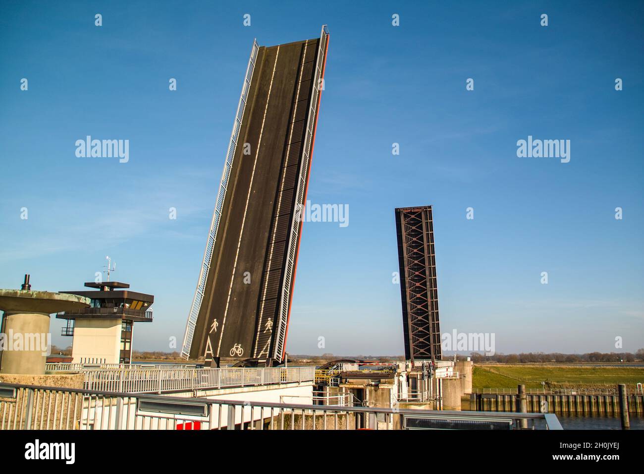 Open bascule bridge at the river mouth of the Hunte into the lower Weser near Elsfleth, Germany, Lower Saxony, Elsfleth Stock Photo