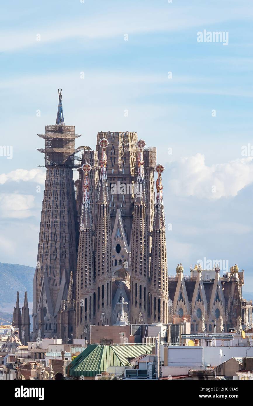 Facade of unfinished sacred family 'La Sagrada Familia' , cathedral designed by Gaudi, being built since 19 March 1882 with people donations. Stock Photo