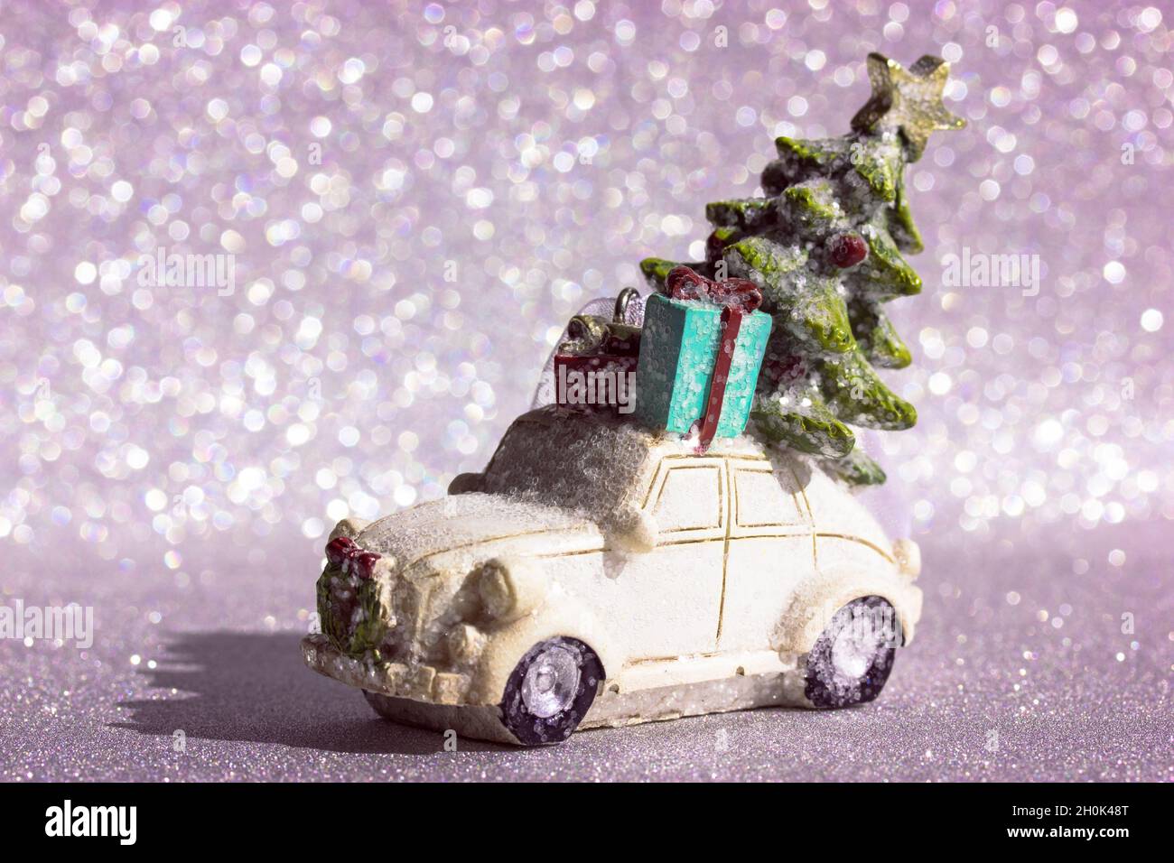 Christmas 2022 Toy Toy Car With Christmas Tree On Roof On Silvered Shining Background New Year  2022 Stock Photo - Alamy