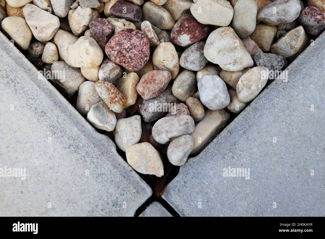 Concrete or cobble gray square pavement slabs or stones for sidewalk, road paving Stock Photo