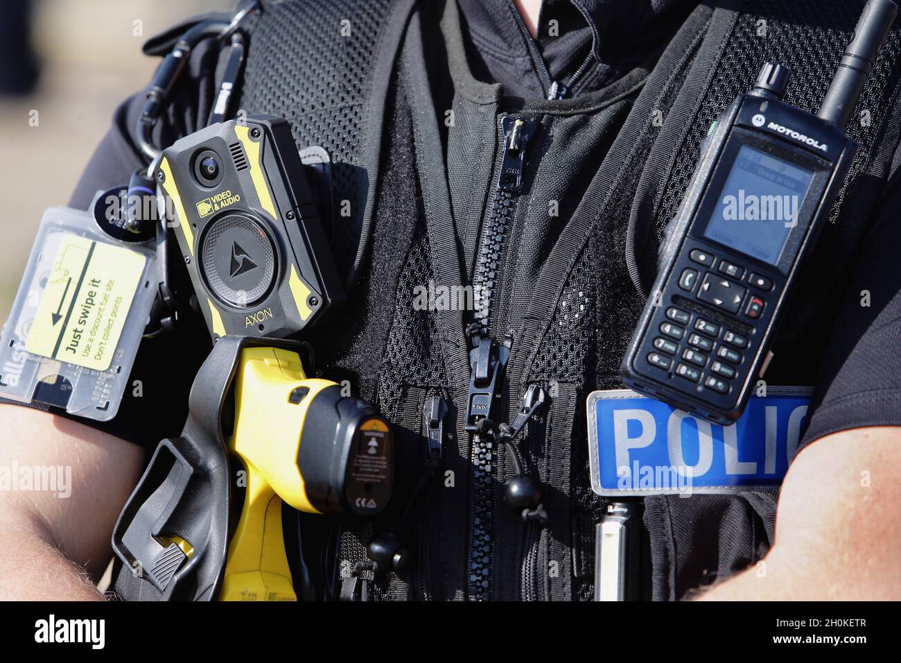 England, Kent, Dungeness, Close up of Police officers stab proof vest with communications and Taser etc. Stock Photo