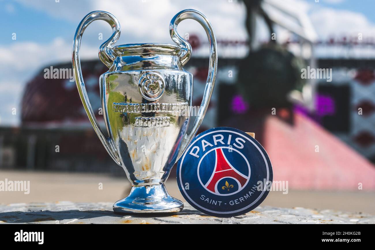 June 14 21 Paris France The Emblem Of The Football Club Paris Saint Germain F C And The Uefa Champions League Cup Against The Backdrop Of A Mode Stock Photo Alamy
