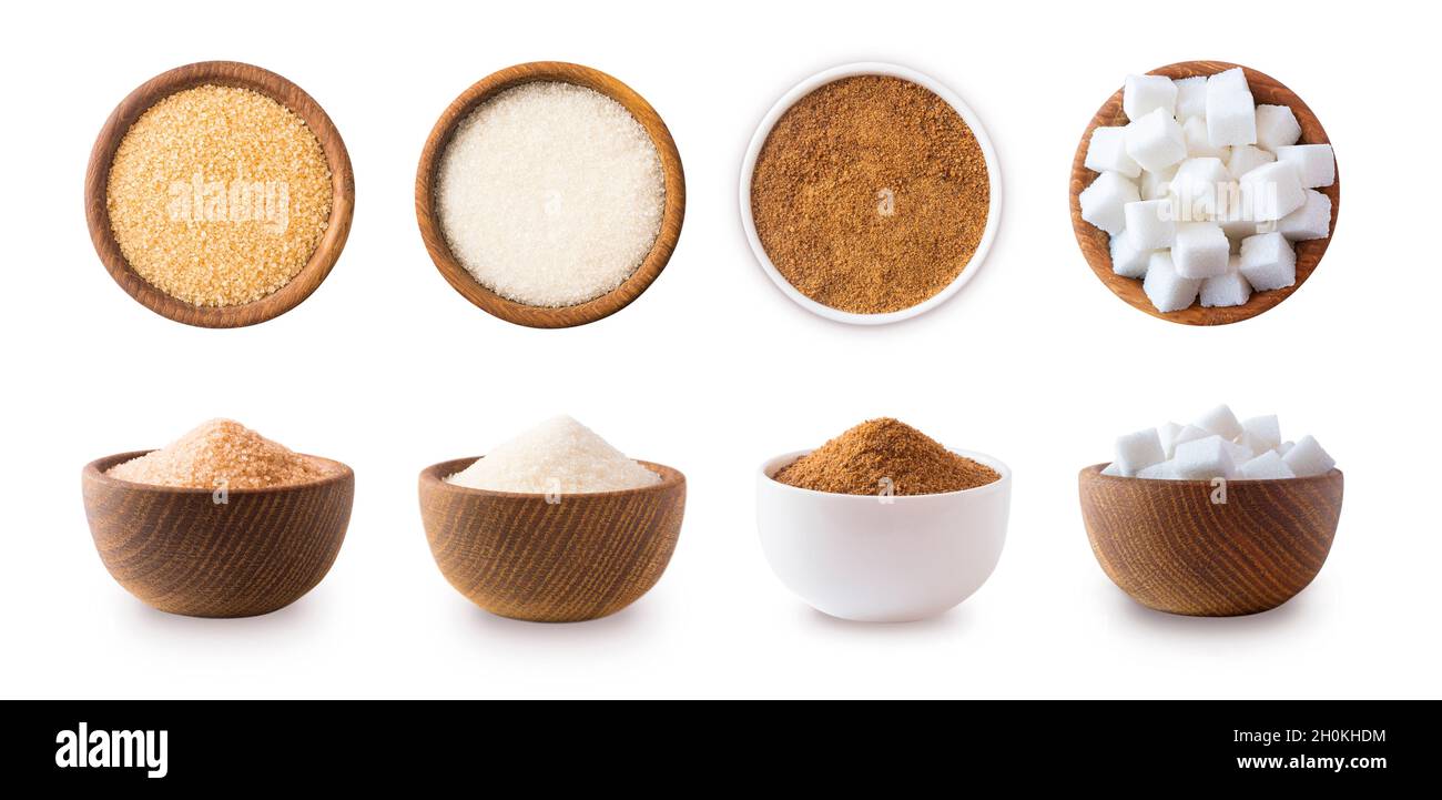 Heap of cane sugar, white and coconut sugar isolated on white Top view