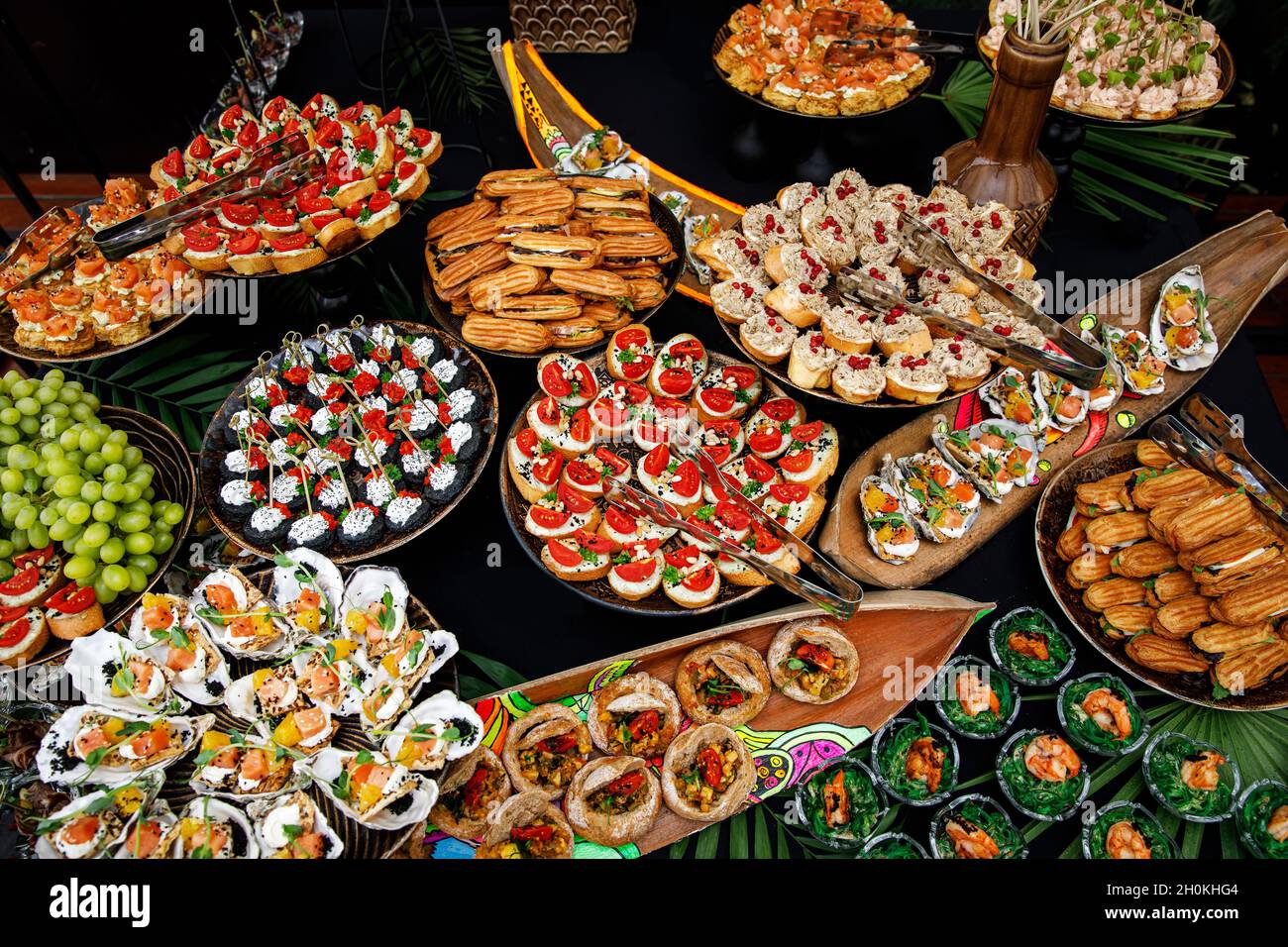 Buffet table of reception with cold snacks, meat, and salads. Top view  Stock Photo - Alamy