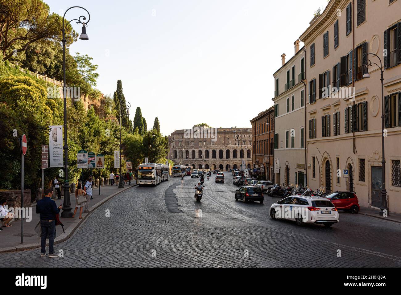 Vehicle traffic on the Via del Teatro di Marcello in Rome Stock Photo