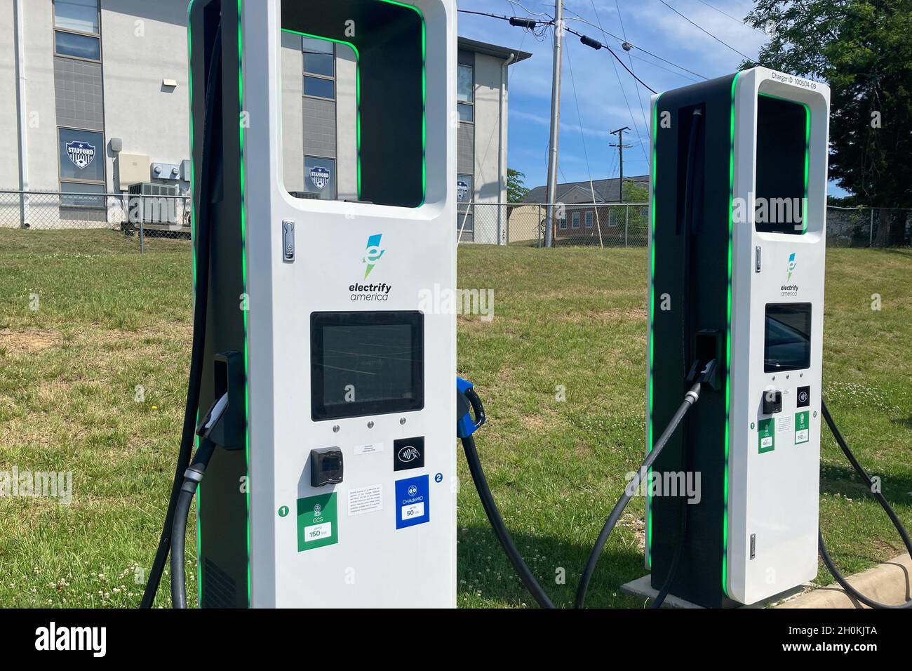 High Speed DC Fast Charging Stations For Electric Vehicles By Electrify America 150 and 350 Kilowatt Charging Stock Photo