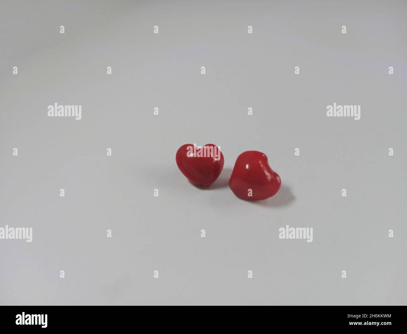 red heart shape saga seeds Stock Photo