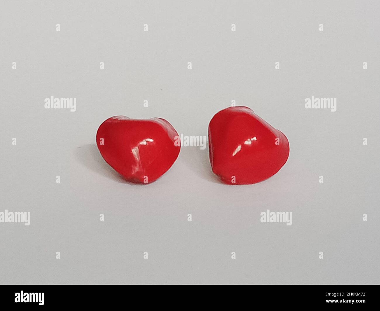 red heart shape saga seeds Stock Photo