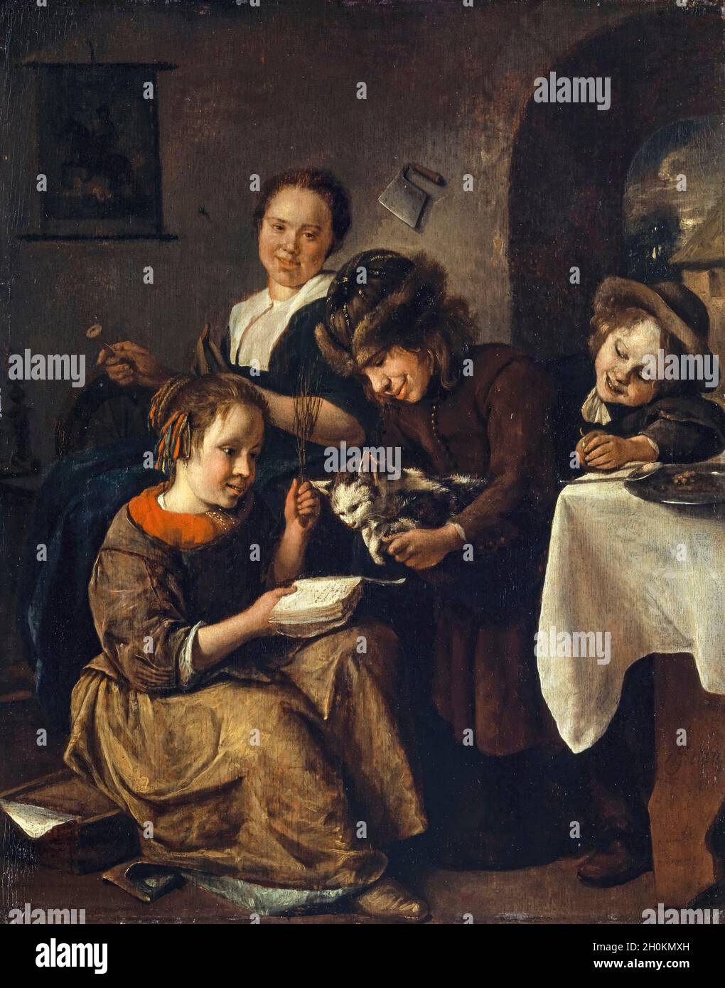 Jan Steen, Children teaching a cat to read, painting, 1665-1668 Stock Photo