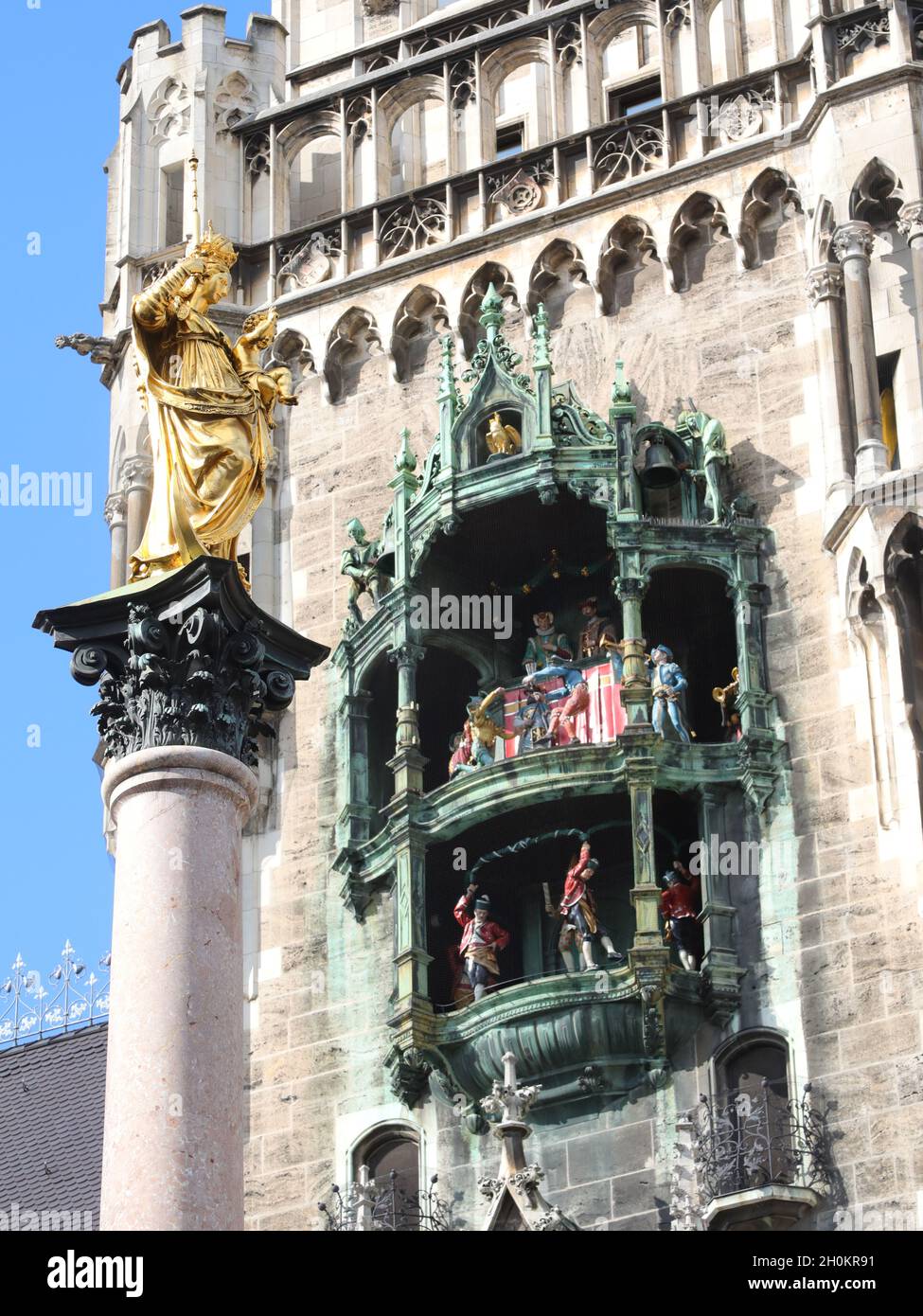 Detail of glockenspiel or carillon in the tower of New town Hall in Munich  Germany and the statue of Mary in Marienplatz the main square of the city  Stock Photo - Alamy
