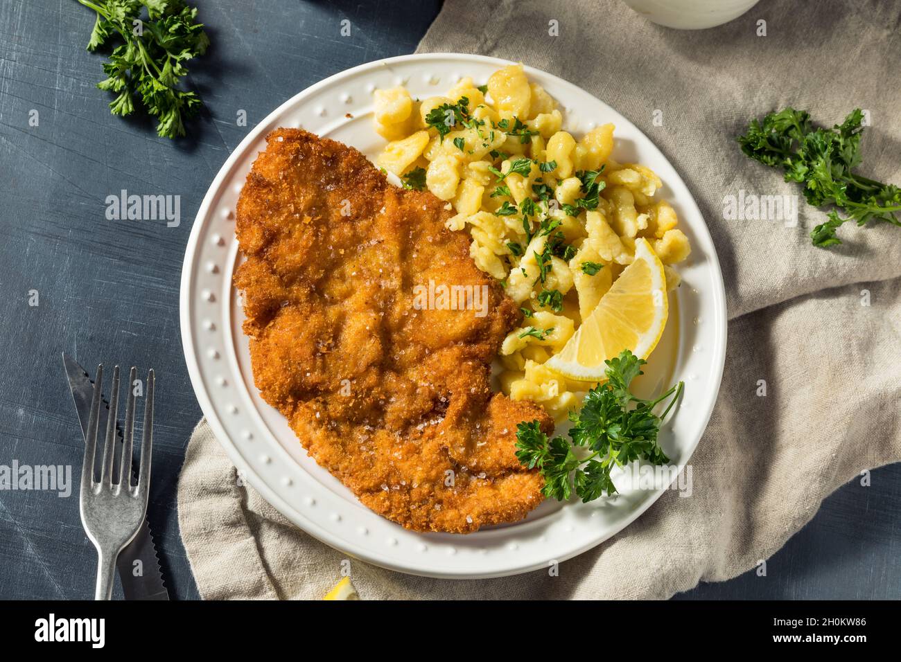 Homemade German Pork Schnitzel with Egg Spaetzle Stock Photo - Alamy Homemade German Pork Schnitzel with Egg Spaetzle Stock Photo - Alamy