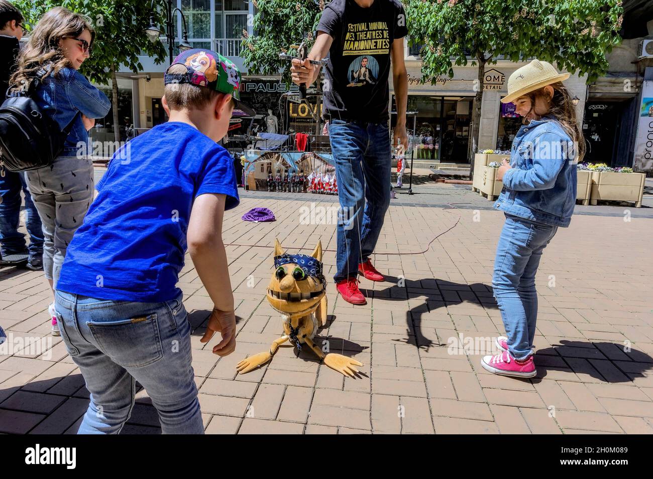 street artist entertains children.Sofia Bulgaria. Stock Photo