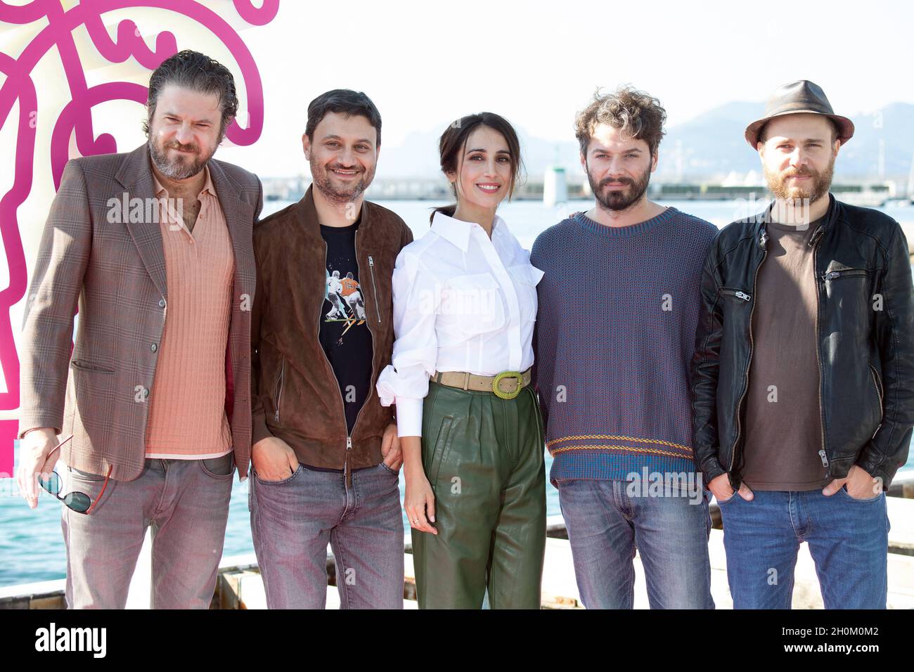 Edoardo Pesce, scenarist Valerio Cilio, actress Silvia D amico, creator Stefano Lodovichi and film music composer Giorgio Giampa attend the Christian photocall during the 4th edition of the Cannes International Series Festival (Canneseries) in Cannes, on October 13, 2021, France. Photo by David Niviere/ABACAPRESS.COM Stock Photo