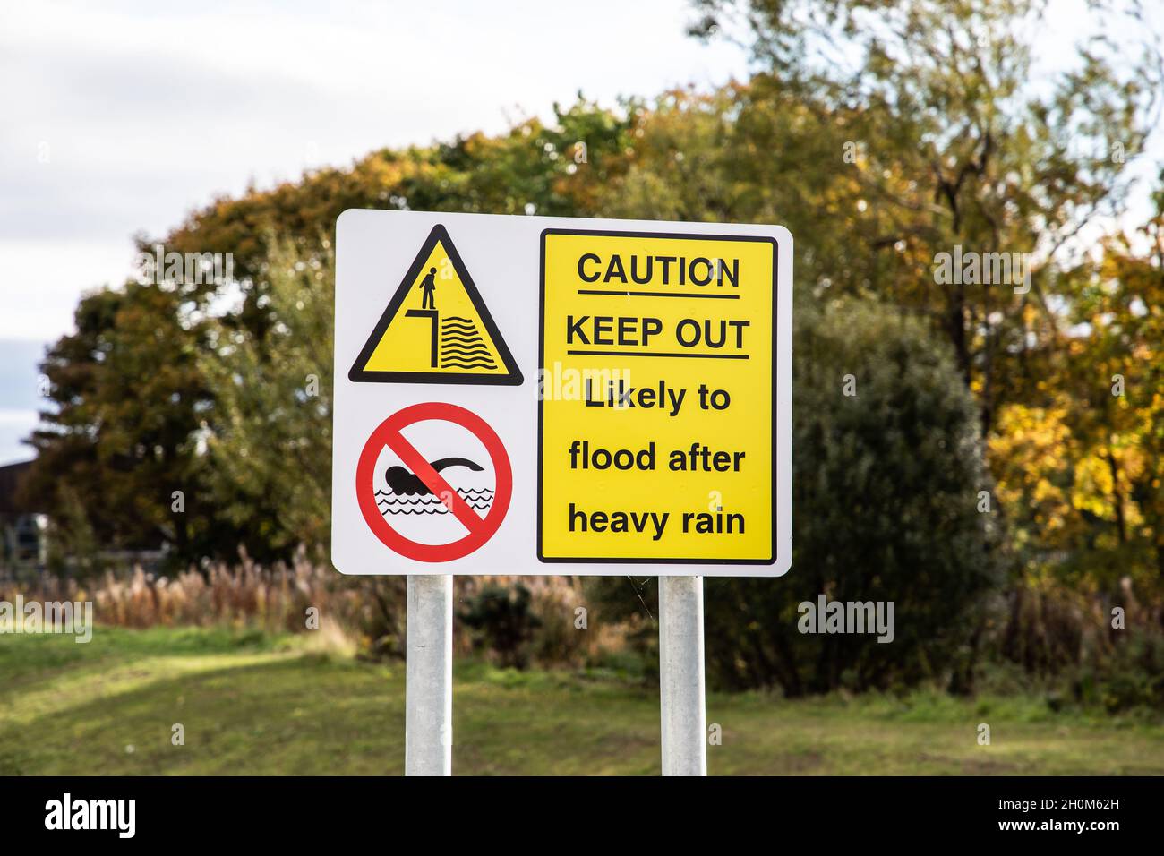 A sign saying Keep Out Likely to Flood After Heavy Rain Stock Photo