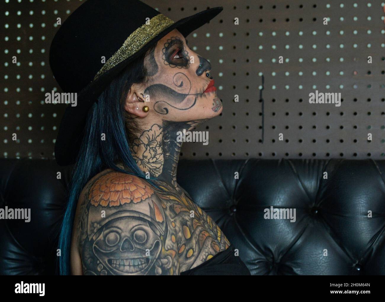 Colombian tattoo artist Lina Matilde Sánchez, poses for photos in her tattoo  studio 'Tattoo studio Catrina'. For more than 16 years she has been a tattoo  artist, she is the first woman, image size:1300x1018