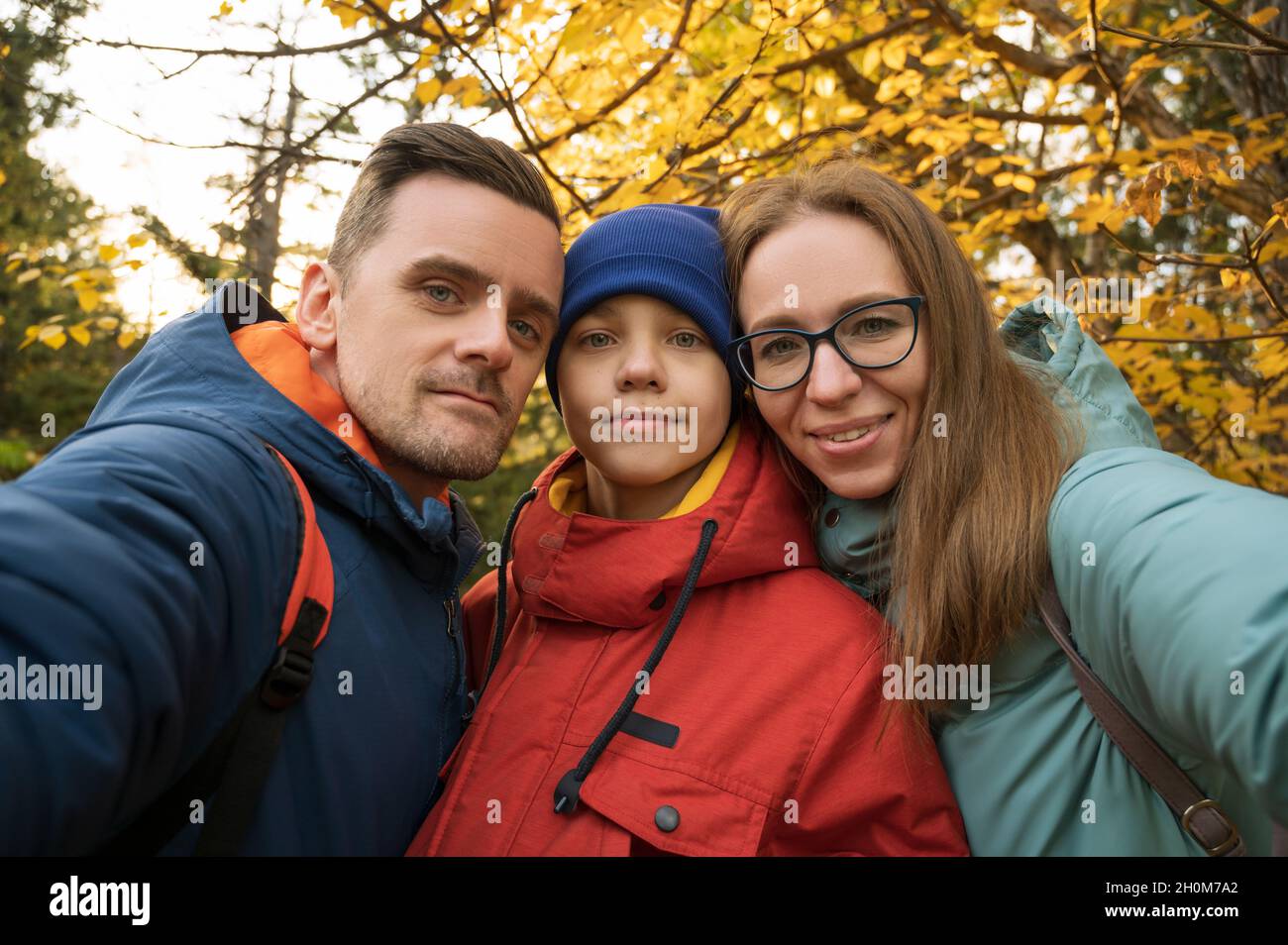 Happy family selfie in autumn park on fall nature background Stock ...