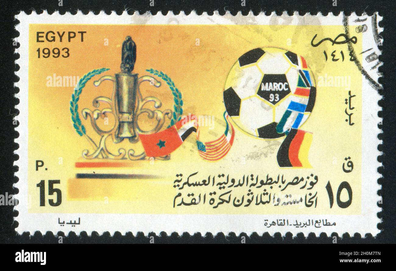 EGYPT - CIRCA 1993: stamp printed by Egypt, shows Soccer ball, Trophy, National flags, circa 1993 Stock Photo