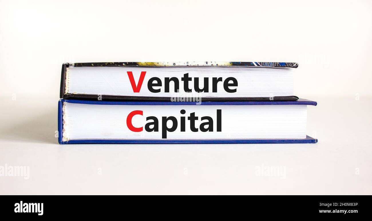 VC venture capital abbraviation symbol. Concept words 'VC venture capital'  on books on white table, white background, copy space. Business and VC vent  Stock Photo - Alamy