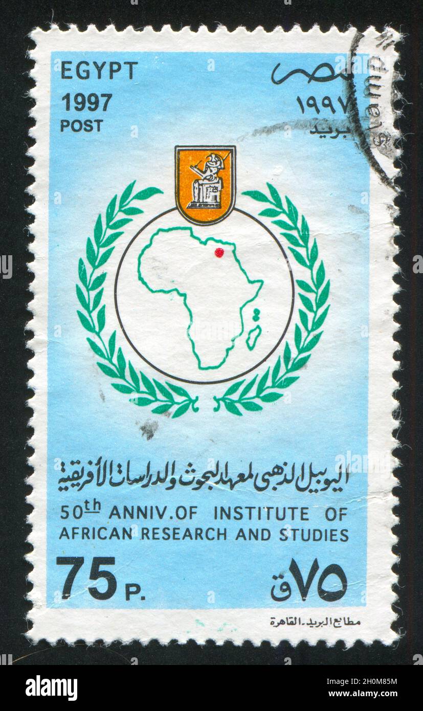 EGYPT - CIRCA 1997: stamp printed by Egypt, shows Map of Africa, Emblem, circa 1997 Stock Photo