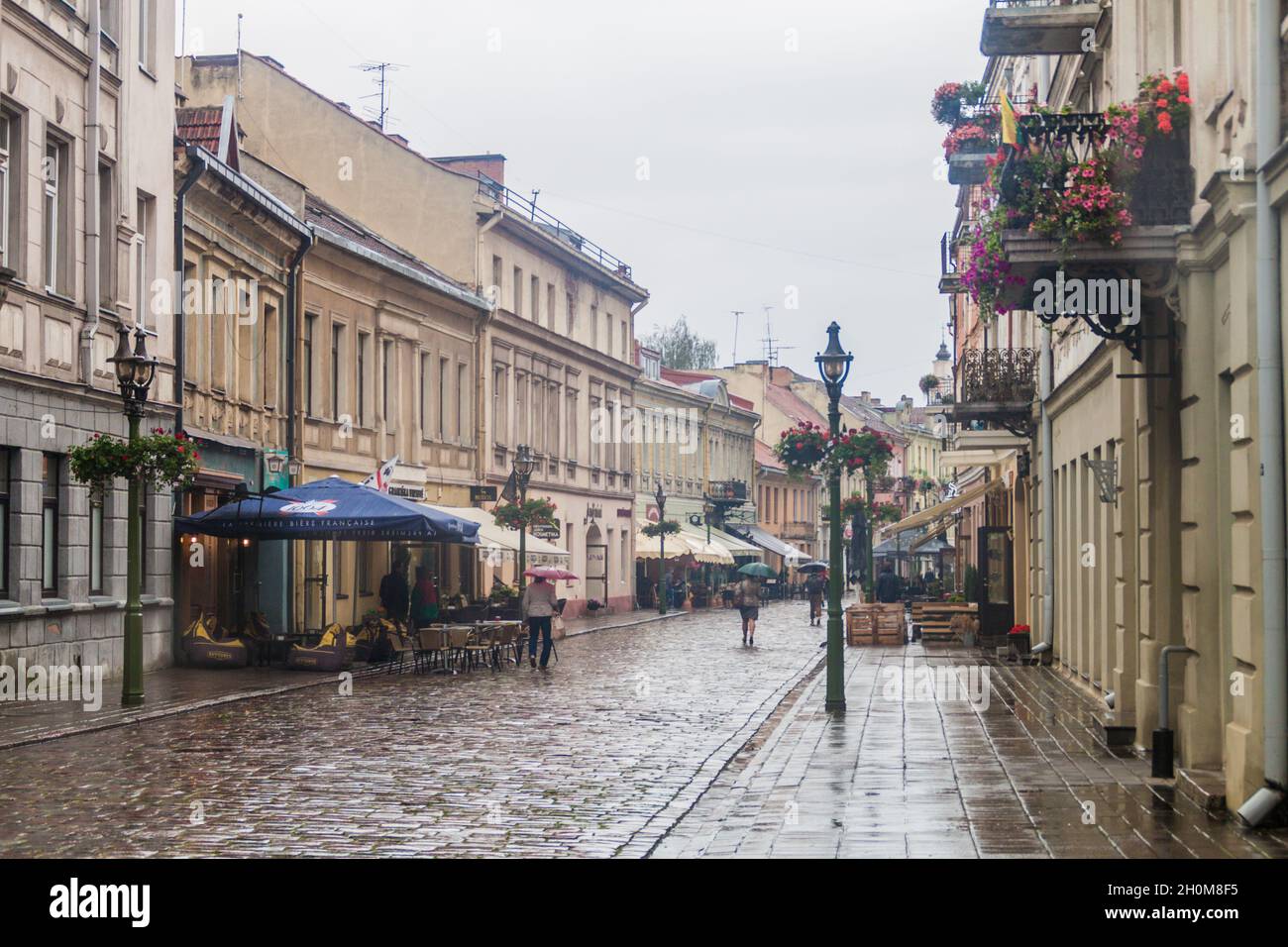 KAUNAS, LITHUANIA - AUGUST 16, 2016: People walk along Vilniaus gatve street in Kaunas, Lithuania Stock Photo