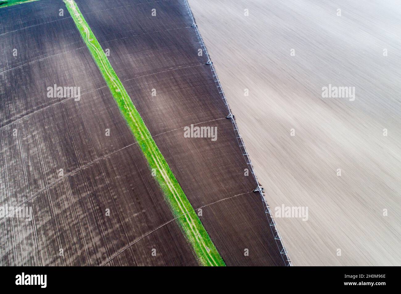 Aerial image of agricultural field with center pivot irrigation systems ...