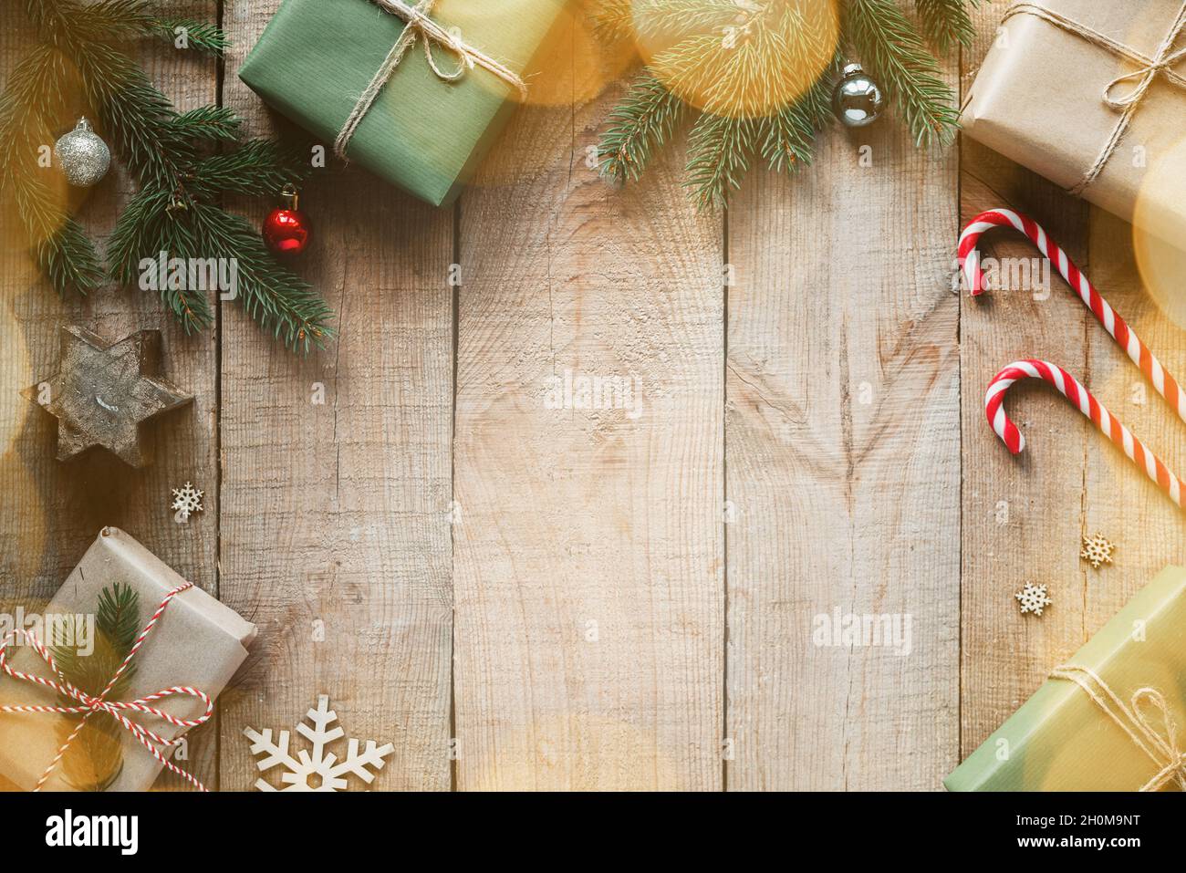 Christmas creative layout with gift boxes, candy canes, and pine tree ...