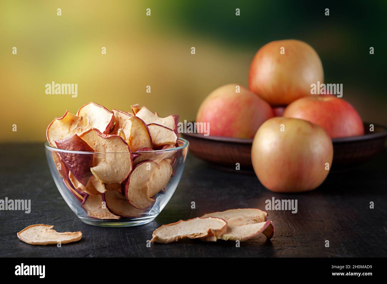 Vegetarian fruit snacks. Organic apple chips on the table outdoors