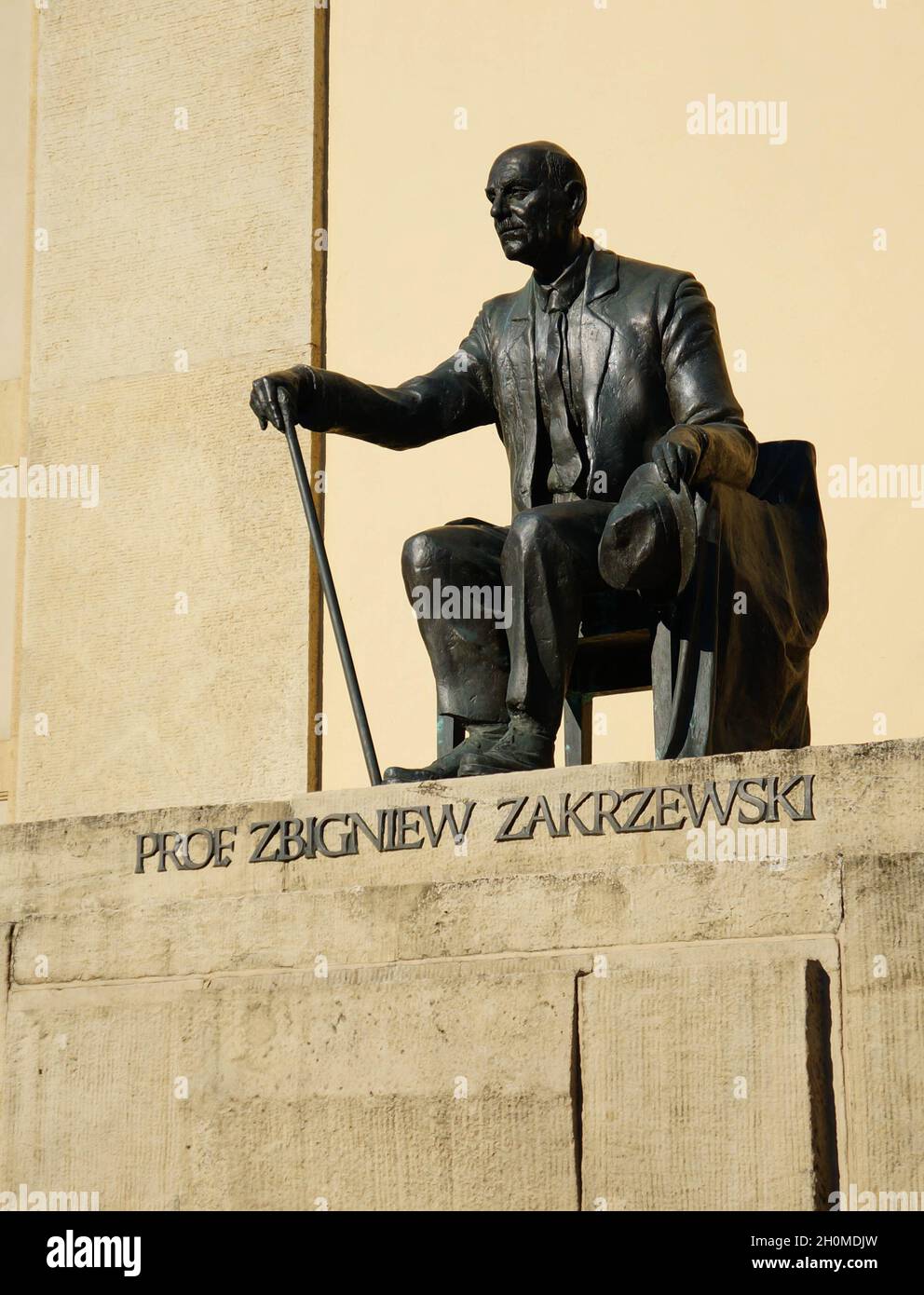 POZNAN, POLAND - Oct 18, 2015: The Statue of Professor Zbigniew Zakrzewski by the university building Stock Photo