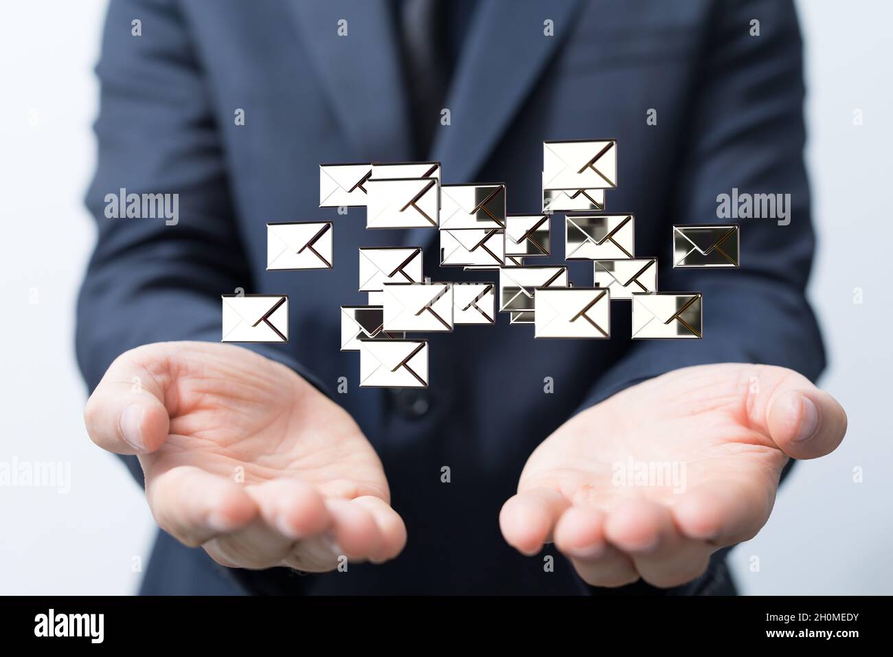 3D rendering of email inbox icons floating on a businessman's hand ...
