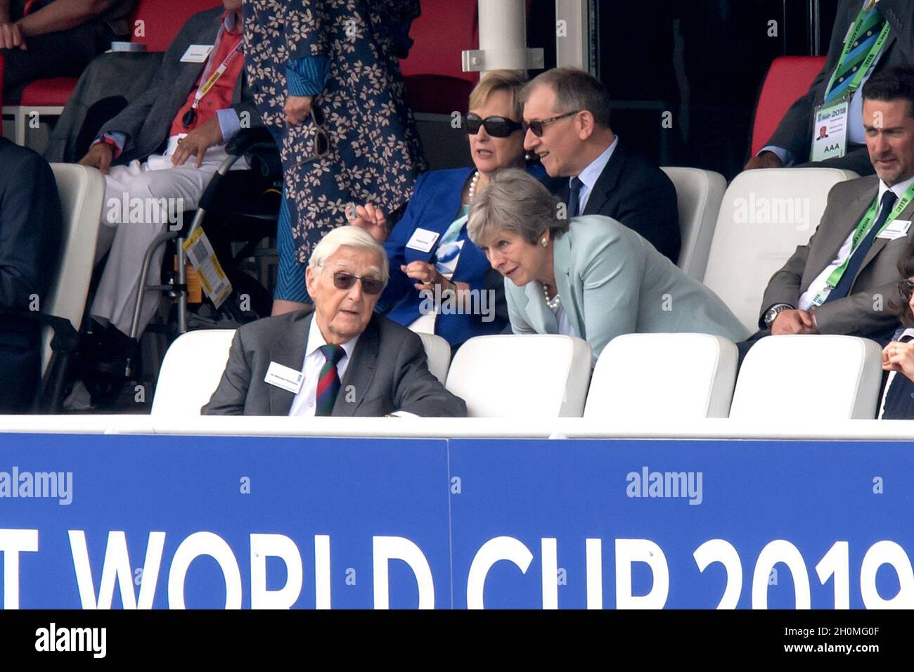 Prime Minister Theresa May speaks with Sir Michael Parkinson Stock Photo