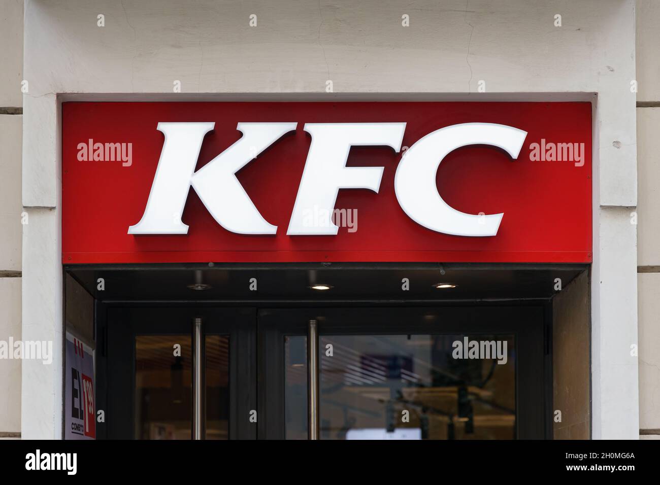 VALENCIA, SPAIN - SEPTEMBER 21, 2021: KFC is an American fast food restaurant chain that specializes in fried chicken Stock Photo