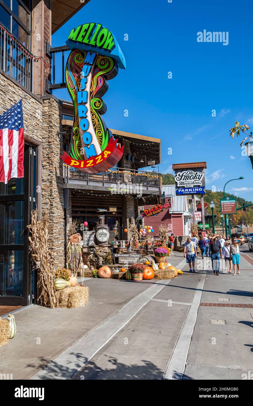 Tourists walk along US highway 441 through downtown Gatlinburg