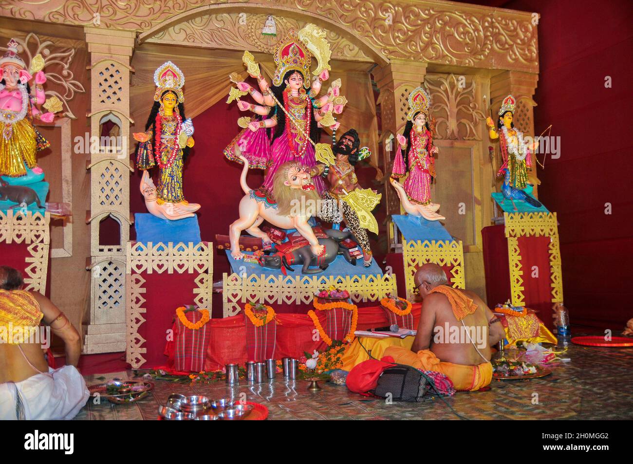 Sylhet, Bangladesh. 13th October 2021. The priest is reciting the