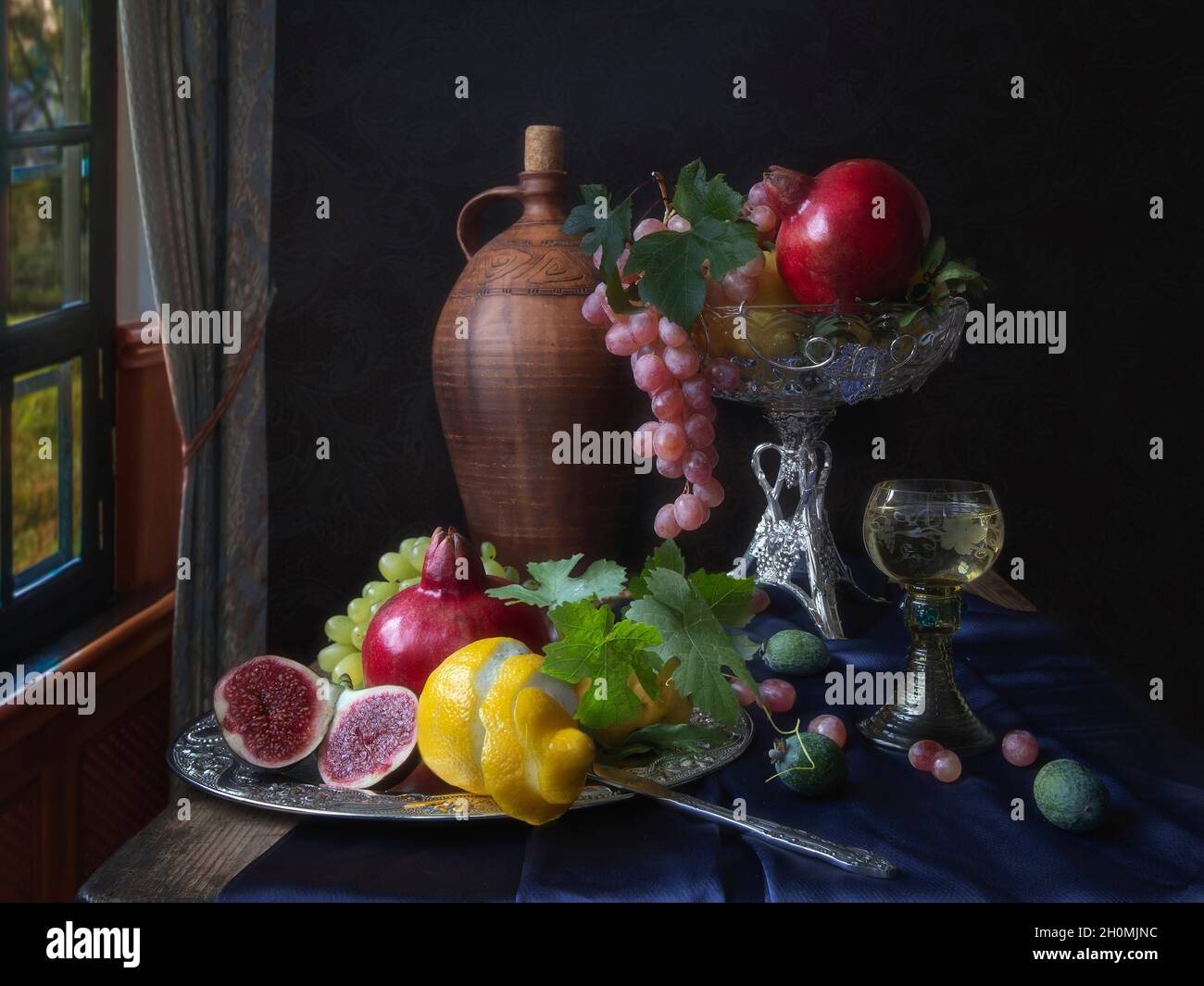 Still life with fruits and wine Stock Photo - Alamy