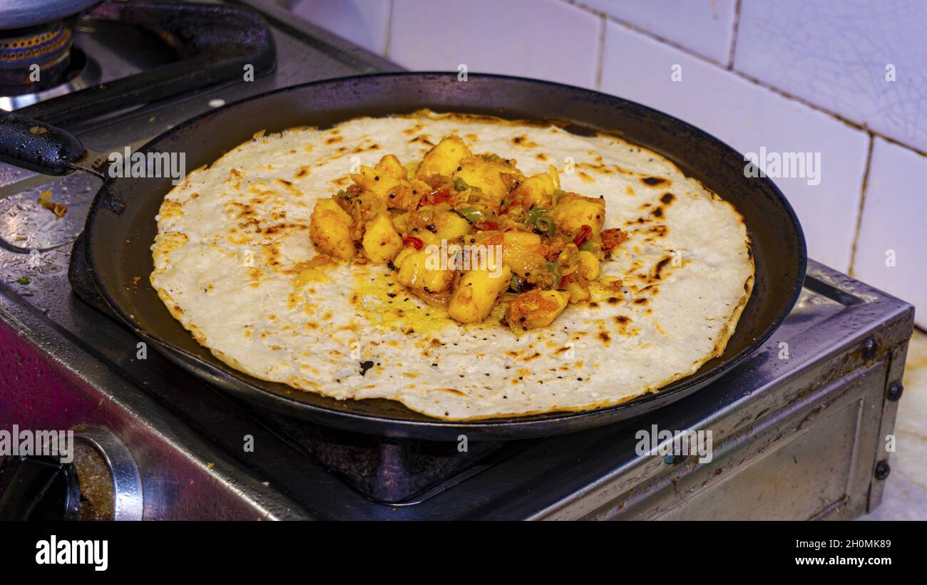Traditional Indian cuisine. Vegetarian Dosa With Fried Potato Filling