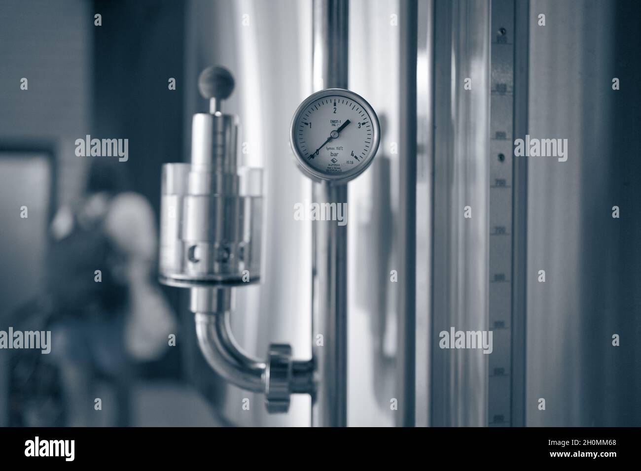 Manometers on steel cylinder storages or vats or tanks on beer and ...