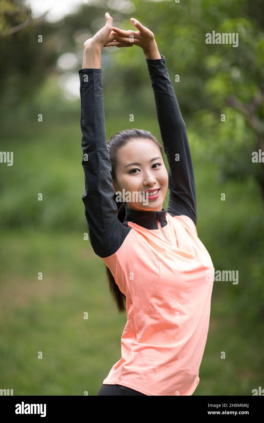Cheerful woman in exercise hi-res stock photography and images - Alamy
