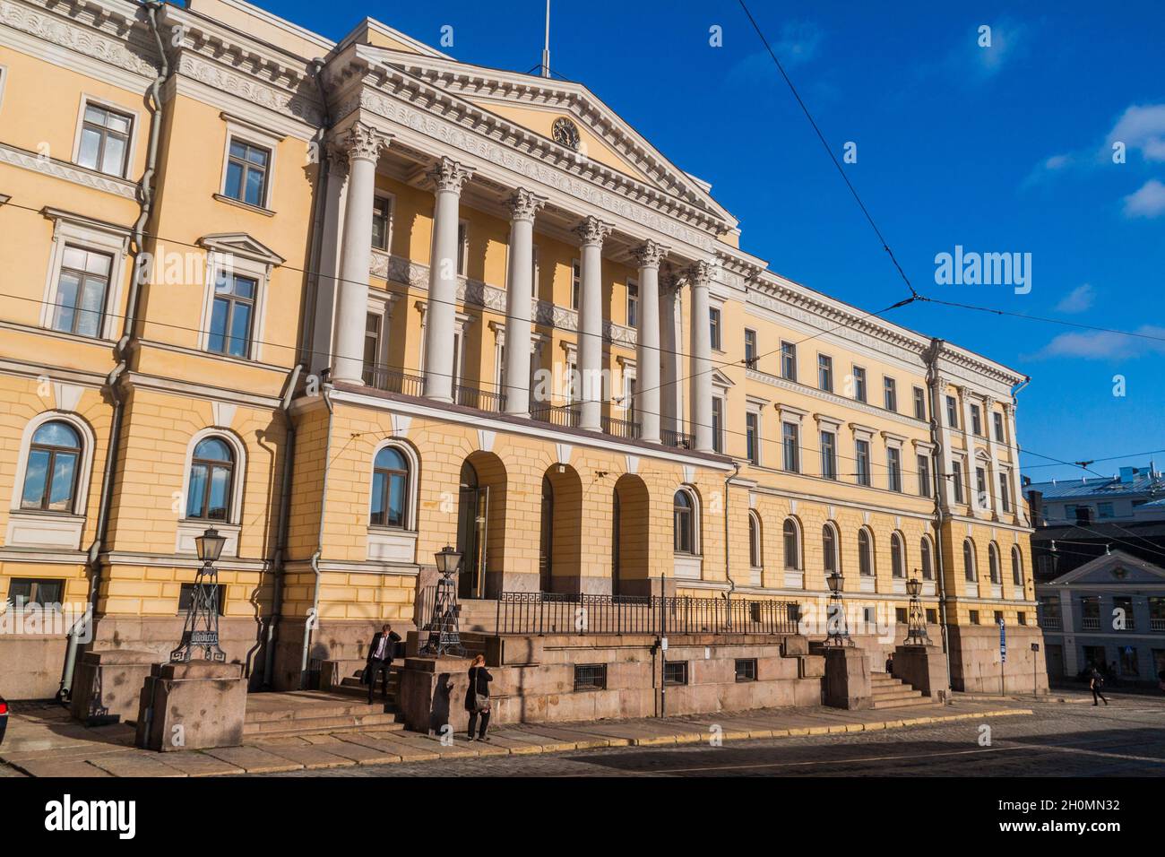 HELSINKI, FINLAND - AUGUST 24, 2016: Yellow colored columned Government Palace on the Senate Square in Helsinki Stock Photo