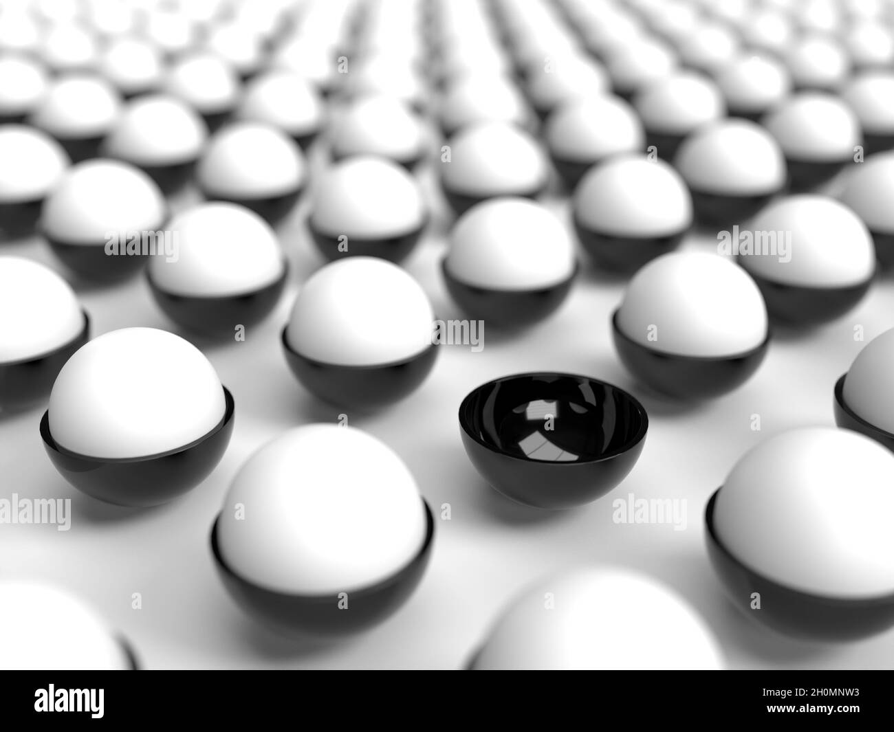 A missing ball in a field of white balls Stock Photo