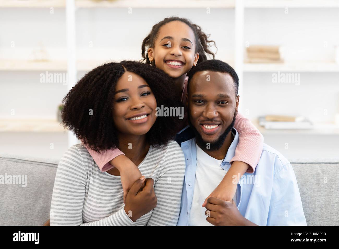 Portrait of happy black family smiling posing for photo Stock Photo - Alamy