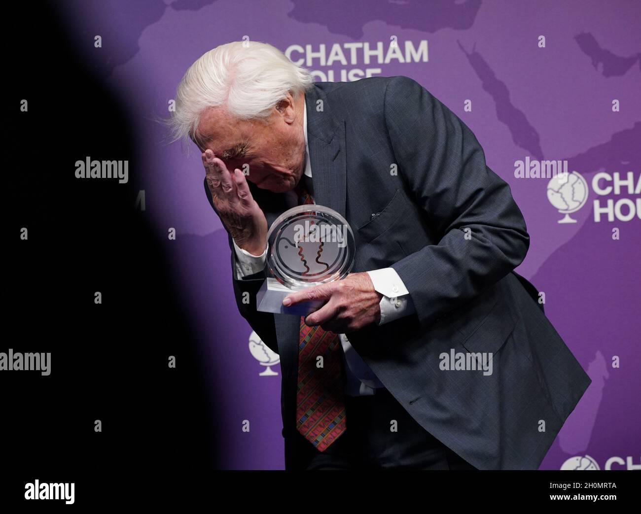 sir-david-attenborough-is-presented-with-a-chatham-house-centenary