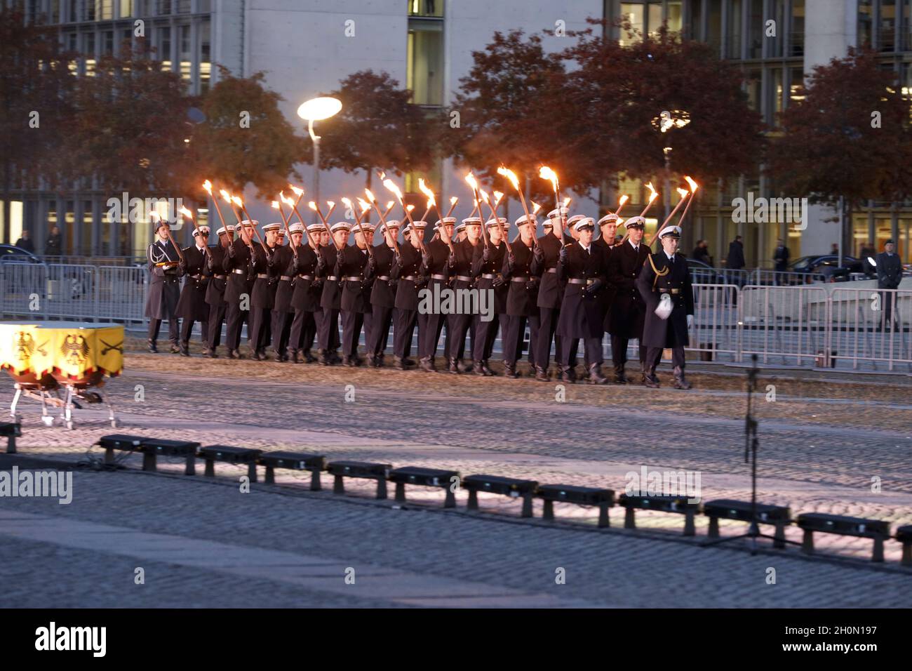 Berlin, Germany, 13th Oct, 2021.After almost twenty years, the Bundeswehr's mission in Afghanistan has finally come to an end as of August 27, 2021. The appreciation of the mission culminates with a Great Taps ceremony in front of the Reichstag in Berlin. The Great Taps is a solemn military ceremony held in the evening, performed by a special formation of military musicians, gunmen and torchbearers designated only for this purpose. Credit: Juergen Nowak / Alamy Live News. Stock Photo