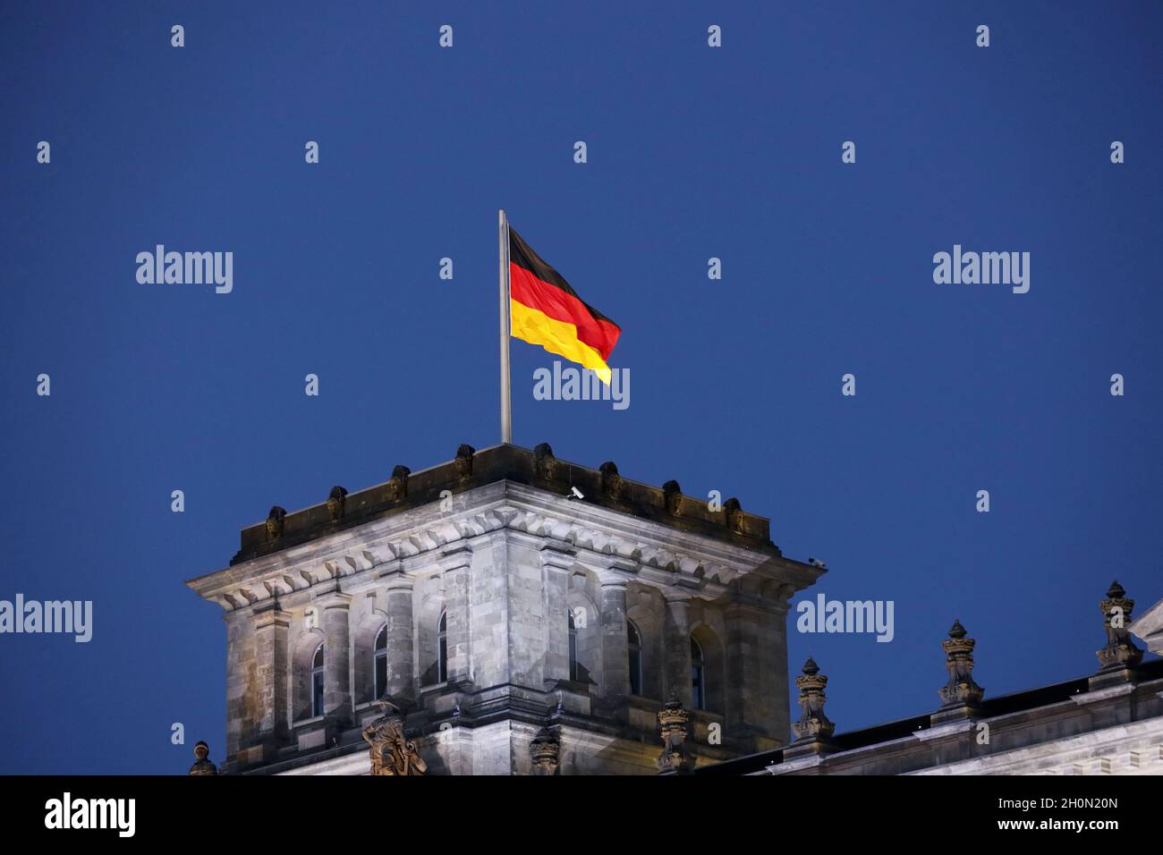 Berlin, Germany, 13th Oct, 2021.After almost twenty years, the Bundeswehr's mission in Afghanistan has finally come to an end as of August 27, 2021. The appreciation of the mission culminates with a Great Taps ceremony in front of the Reichstag in Berlin. The Great Taps is a solemn military ceremony held in the evening, performed by a special formation of military musicians, gunmen and torchbearers designated only for this purpose. Credit: Juergen Nowak / Alamy Live News. Stock Photo