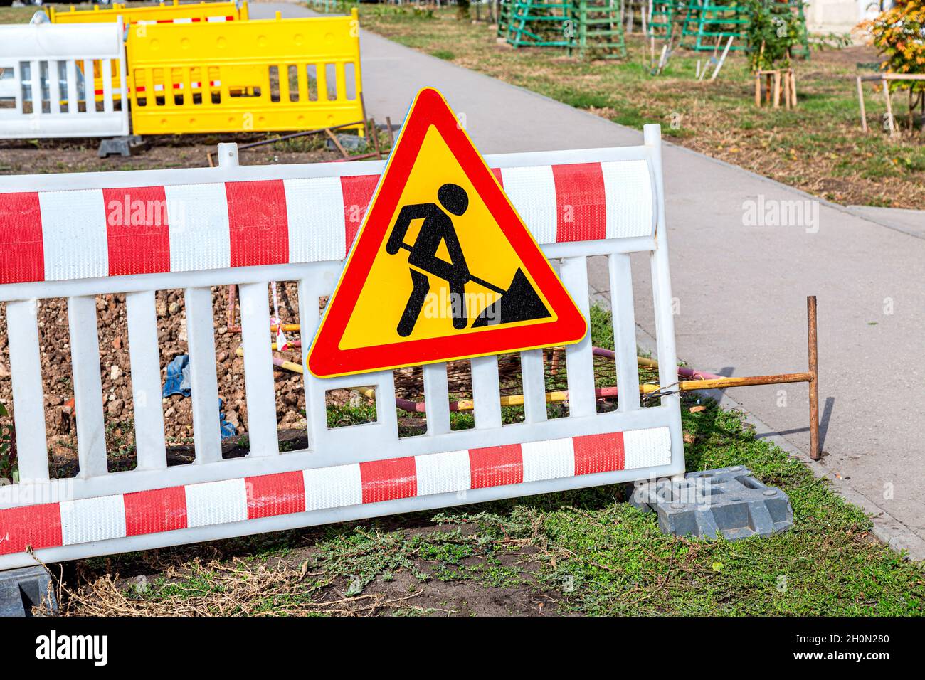 Road works traffic sign at the city street. Road under construction ...