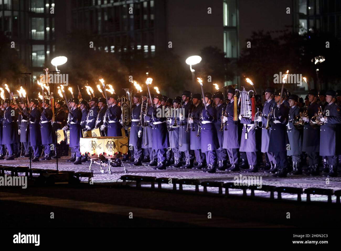 Berlin, Germany, 13th Oct, 2021.After almost twenty years, the Bundeswehr's mission in Afghanistan has finally come to an end as of August 27, 2021. The appreciation of the mission culminates with a Great Taps ceremony in front of the Reichstag in Berlin. The Great Taps is a solemn military ceremony held in the evening, performed by a special formation of military musicians, gunmen and torchbearers designated only for this purpose. Credit: Juergen Nowak / Alamy Live News. Stock Photo