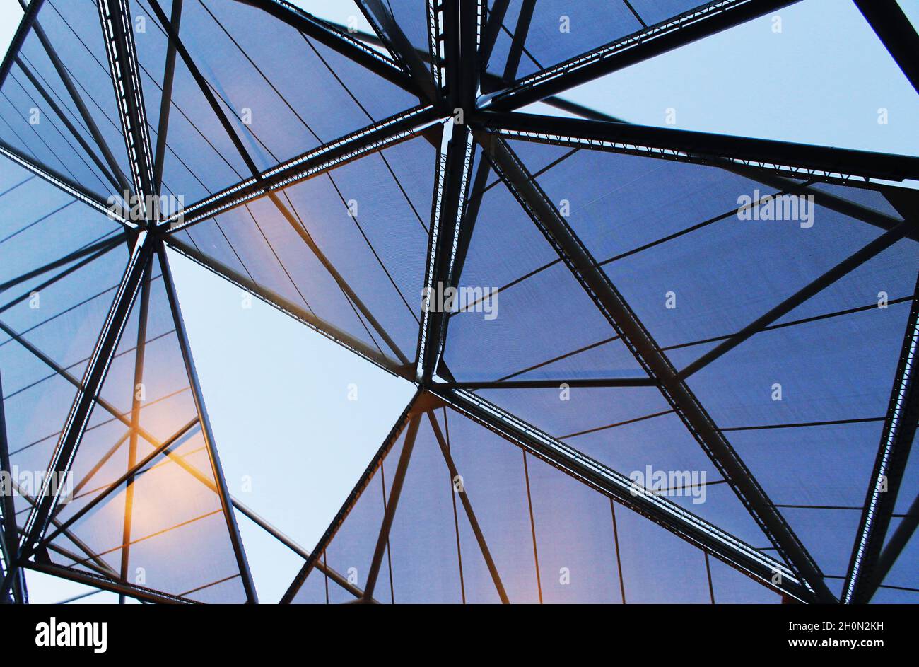 The digitized image is a fragment of the roof and the ceiling with a triangular pattern on the entire structure of the surface mesh Stock Photo