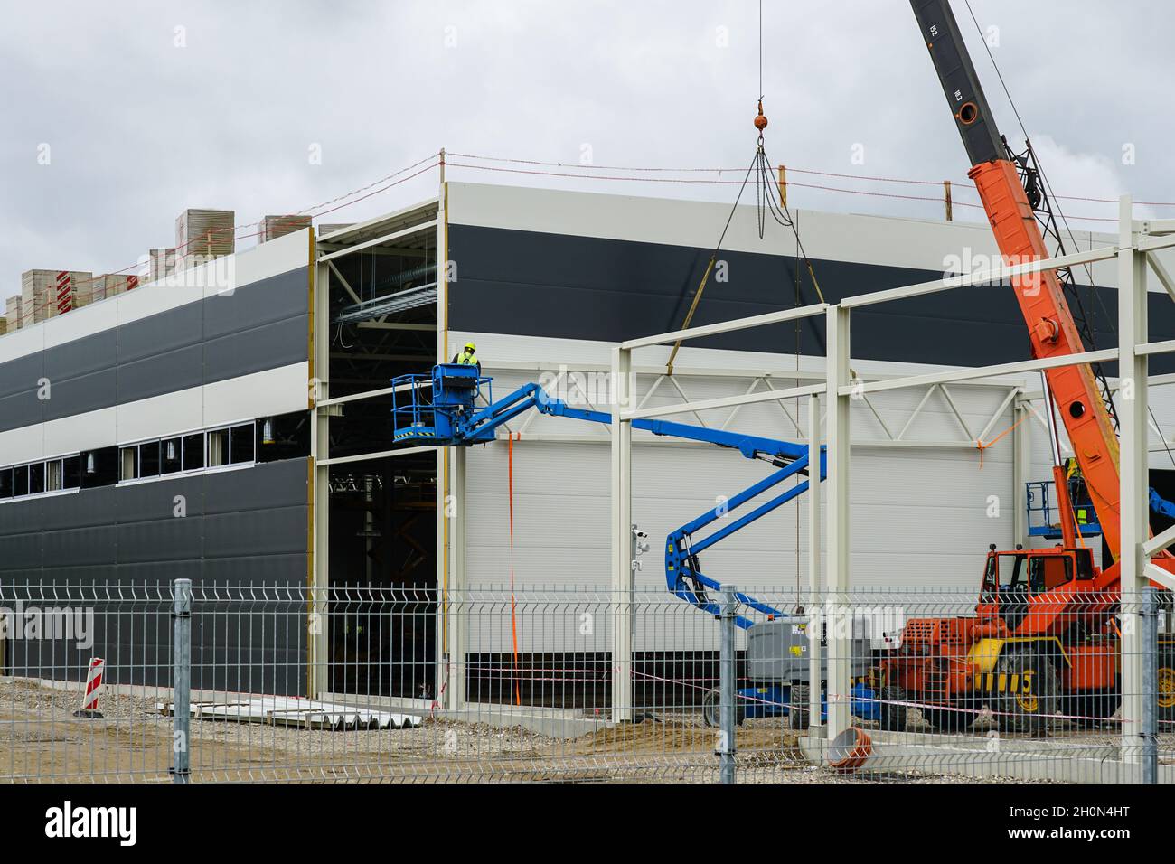 a sandwich panel wall mounting with the help of a modern telescopic ...