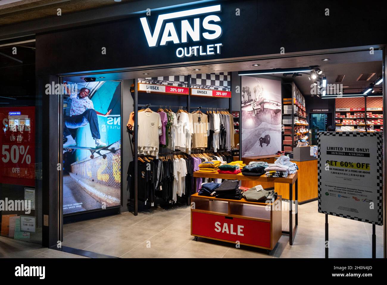 Hong Kong, China. 07th Oct, 2021. The multinational sports clothing brands  Vans and Reebok stores and logos in Hong Kong's Tung Chung district. (Photo  by Budrul Chukrut/SOPA Images/Sipa USA) Credit: Sipa USA/Alamy